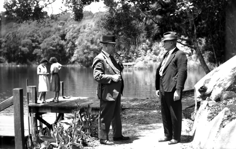 Two engineers in hats inspecting the Burdekin Bridge works in 1947